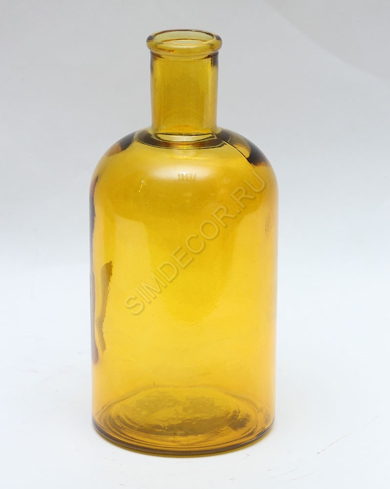 Желтая стеклянная бутылка